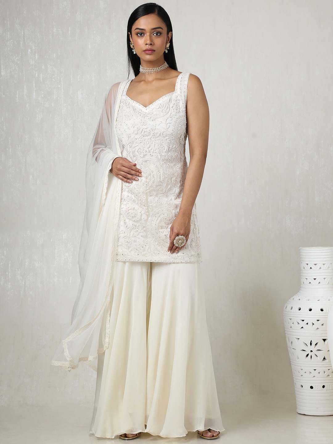 Soch Women Floral Embroidered Regular Sequinned Kurta with Sharara & With Dupatta, Off white
Soch Women Floral Embroidered Regular Sequinned Kurta with Sharara & With Dupatta, Off white