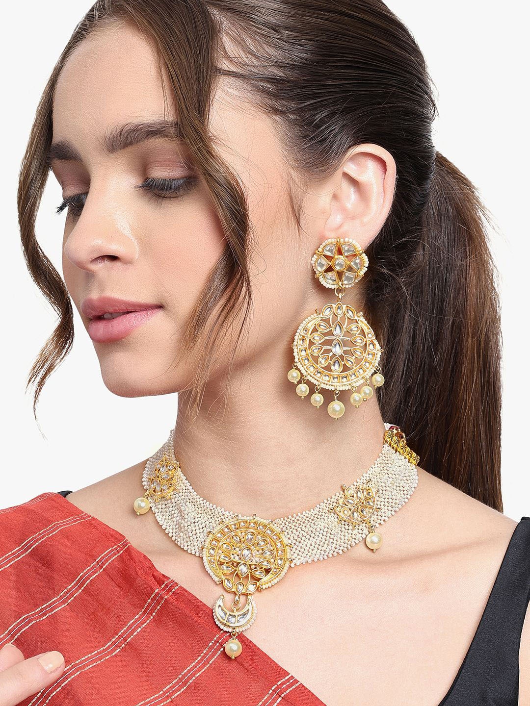 AARSEE OFFICIAL Gold-Plated Kundan Studded & Pearls Contemporary Shaped Drop Earrings
AARSEE OFFICIAL Gold-Plated Kundan Studded & Pearls Contemporary Shaped Drop Earrings