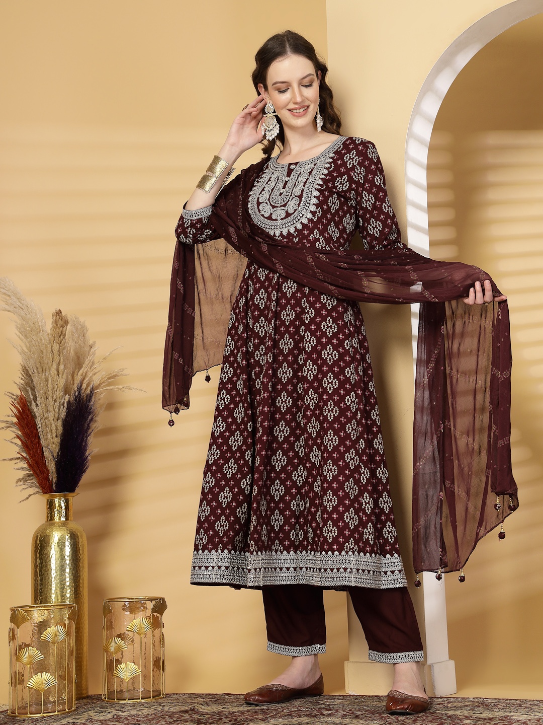 KALINI Women Bandhani Embroidered Regular Kurta with Trousers & With Dupatta, Maroon
KALINI Women Bandhani Embroidered Regular Kurta with Trousers & With Dupatta, Maroon