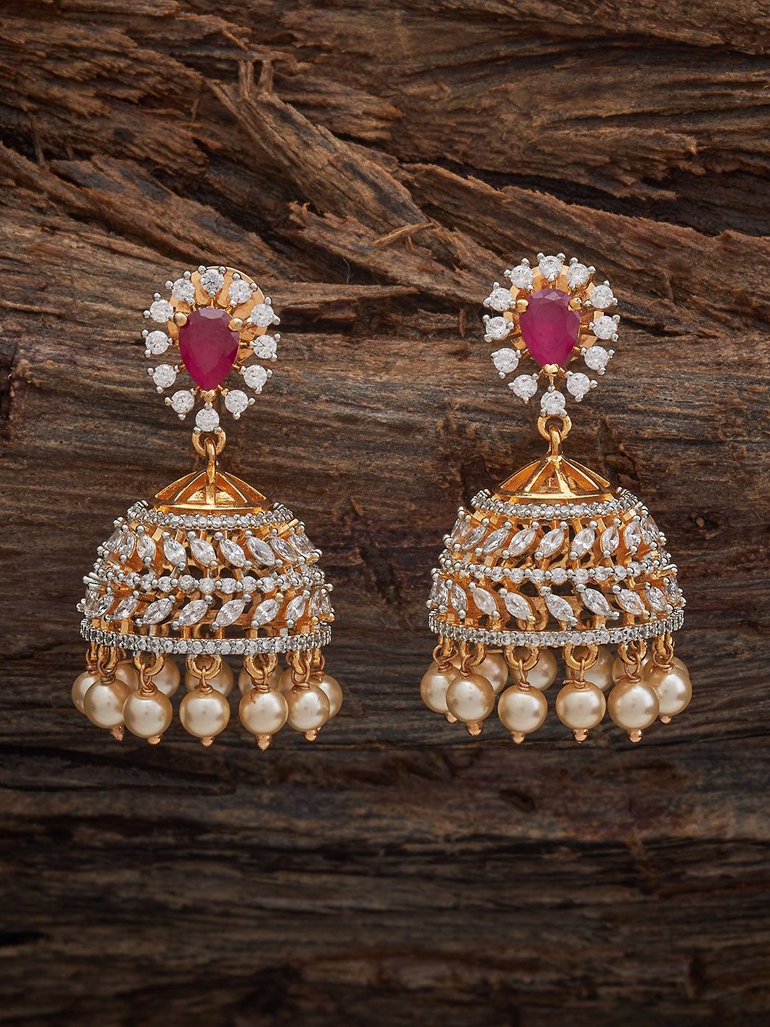 Kushal's Fashion Jewellery Rhodium Gold-Plated Party Zircon Dome Shaped Jhumkas Earrings
Kushal's Fashion Jewellery Rhodium Gold-Plated Party Zircon Dome Shaped Jhumkas Earrings
