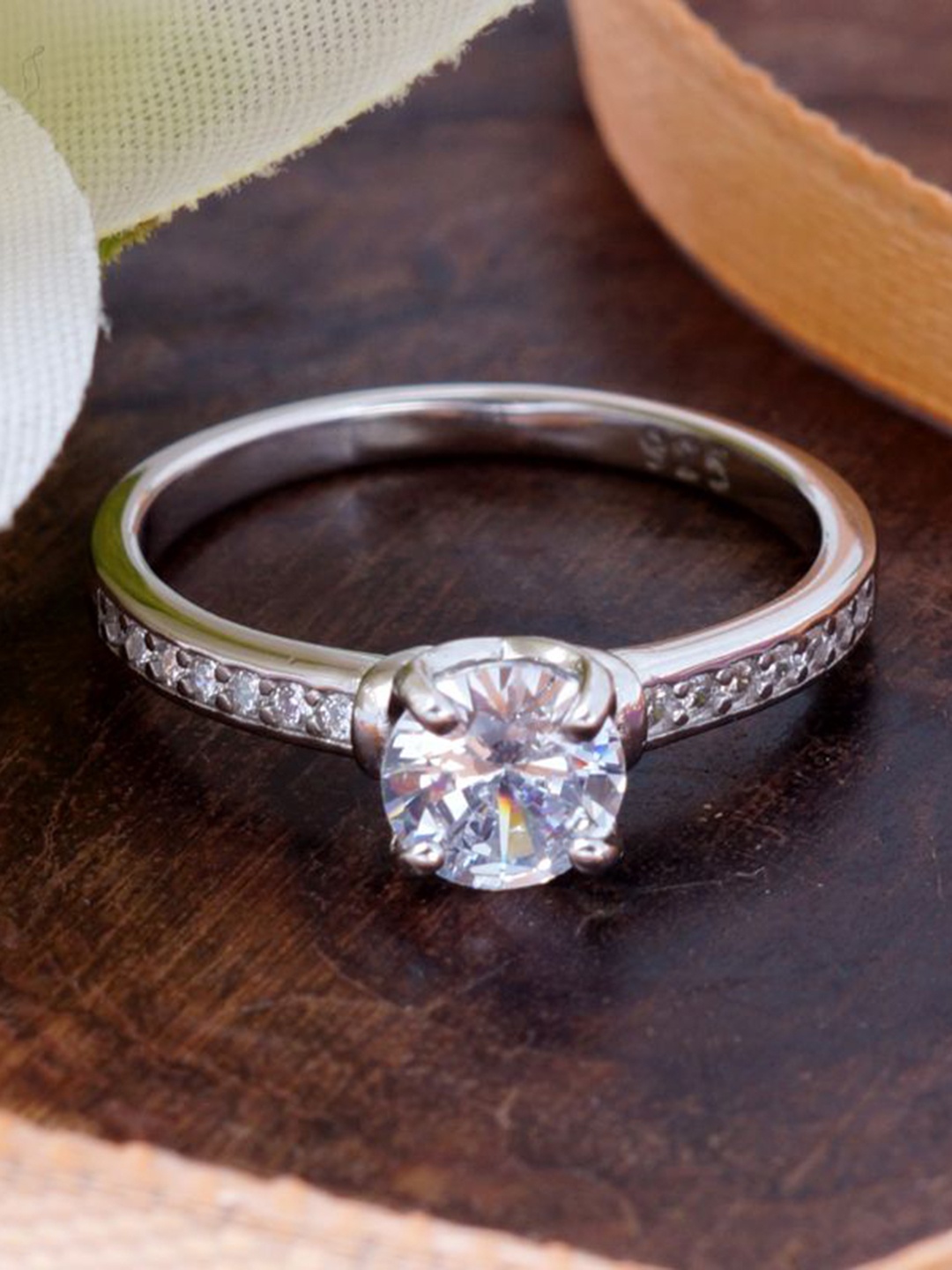 Tuanz Silver Jewelry 925 Sterling Silver Rhodium-Plated Cubic Zirconia-Studded Finger Ring
Tuanz Silver Jewelry 925 Sterling Silver Rhodium-Plated Cubic Zirconia-Studded Finger Ring