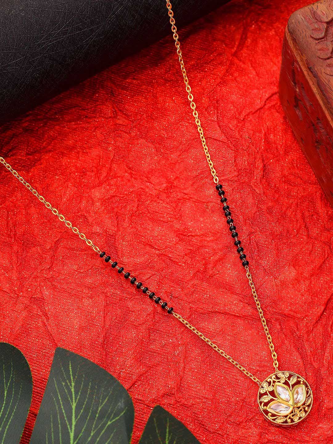AARSEE OFFICIAL 22k Gold-Plated Artificial Stones Studded and Beaded Polki Mangalsutra
AARSEE OFFICIAL 22k Gold-Plated Artificial Stones Studded and Beaded Polki Mangalsutra