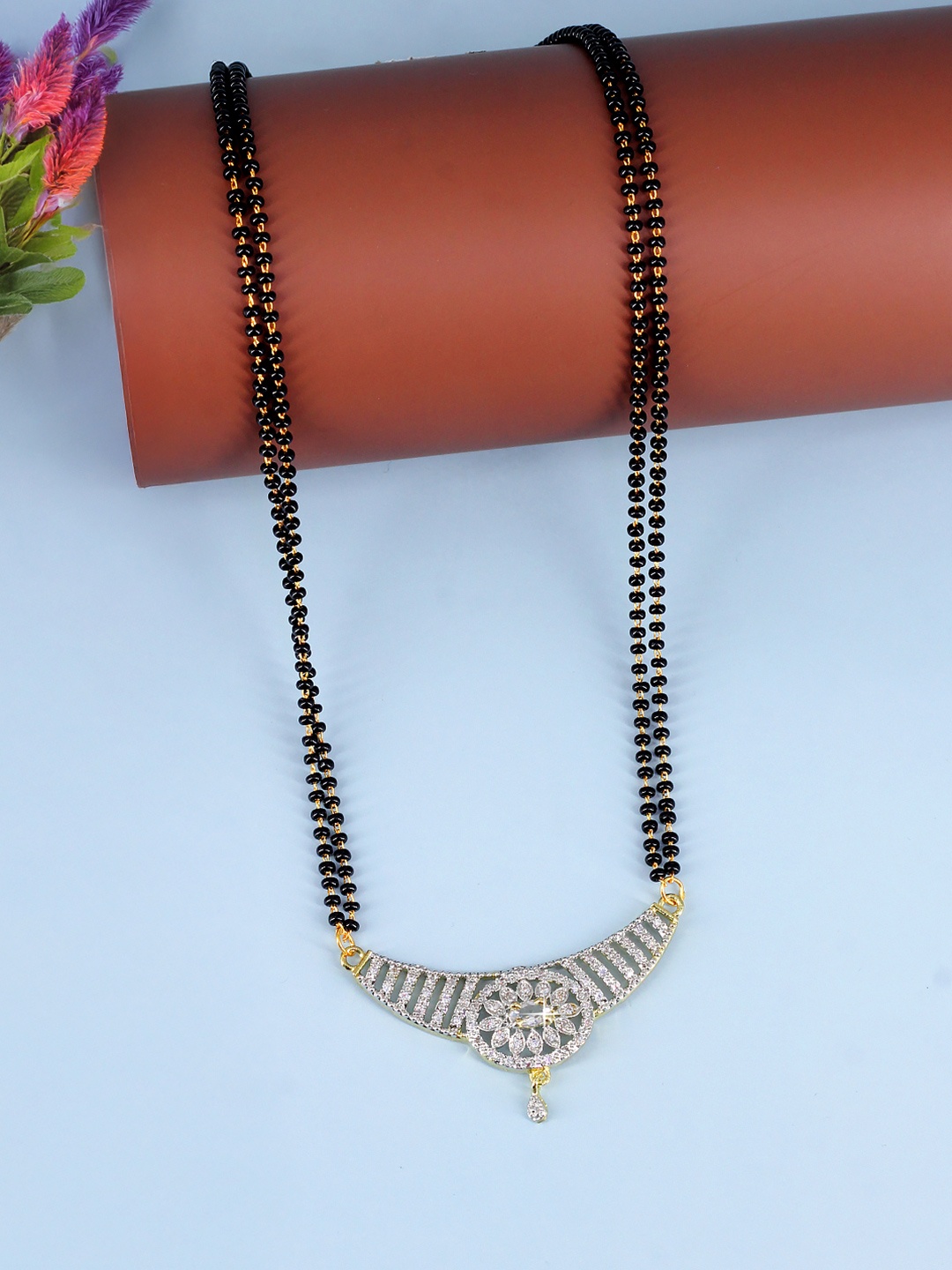 PRIVIU Gold-Plated American Diamond Studded And Beaded Floral Shaped Mangalsutra, Black
PRIVIU Gold-Plated American Diamond Studded And Beaded Floral Shaped Mangalsutra, Black