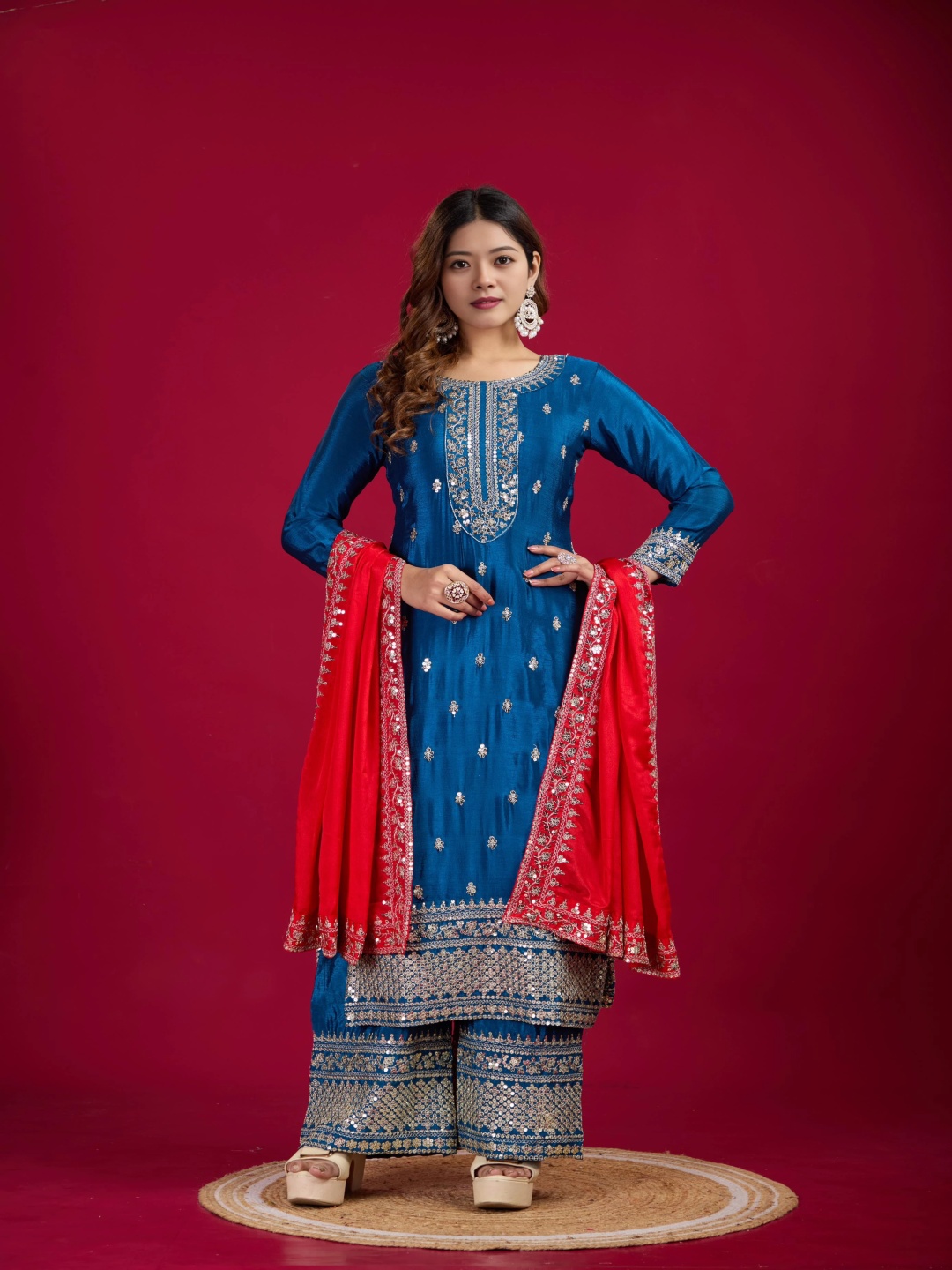 KALINI Women Ethnic Motifs Embroidered Regular Sequinned Kurta with Sharara & With Dupatta, Blue
KALINI Women Ethnic Motifs Embroidered Regular Sequinned Kurta with Sharara & With Dupatta, Blue