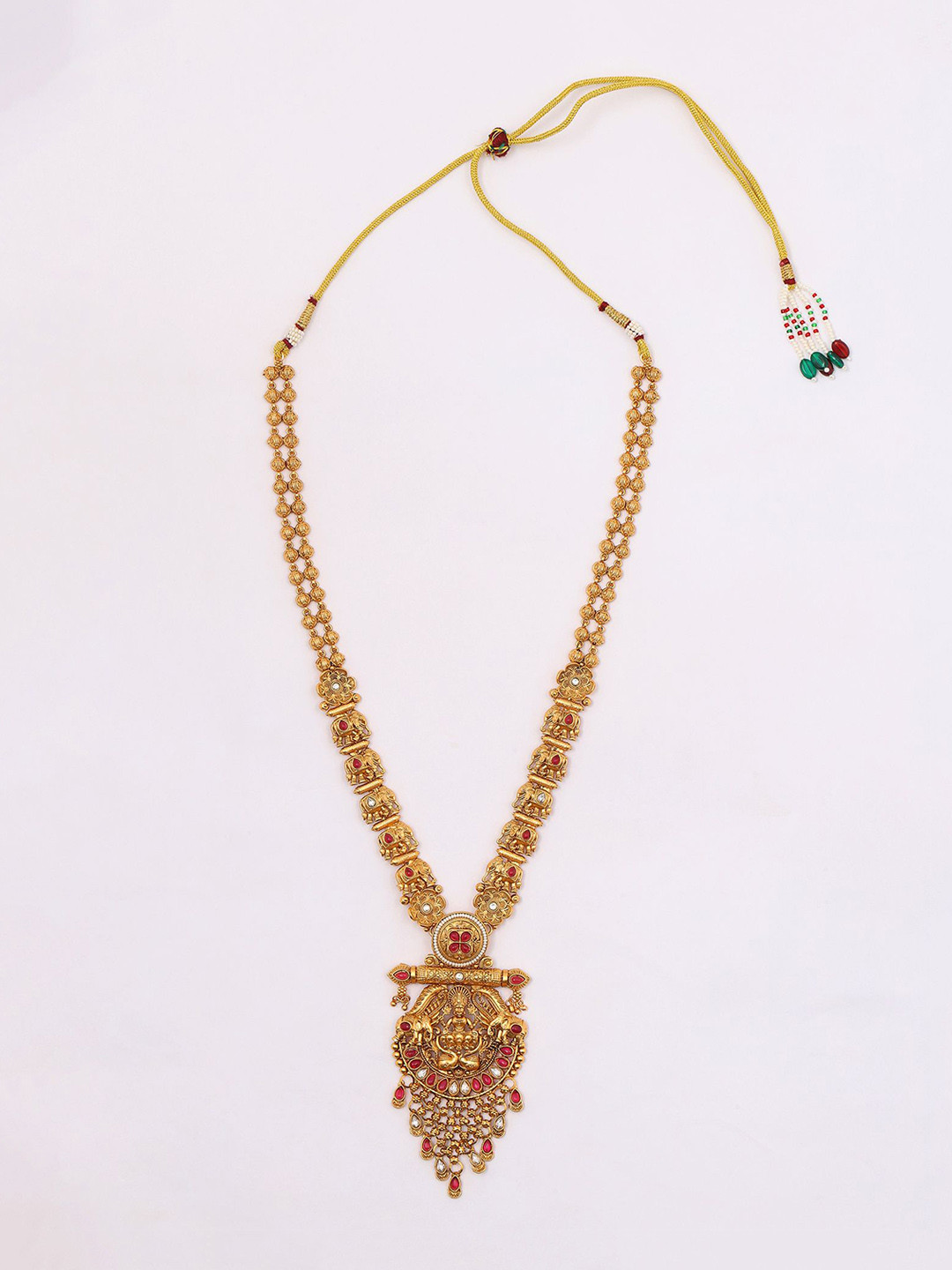Exotic India Stone Studded Goddess Gajalakshmi Long Necklace Set With Earrings, Gold 
Exotic India Stone Studded Goddess Gajalakshmi Long Necklace Set With Earrings, Gold