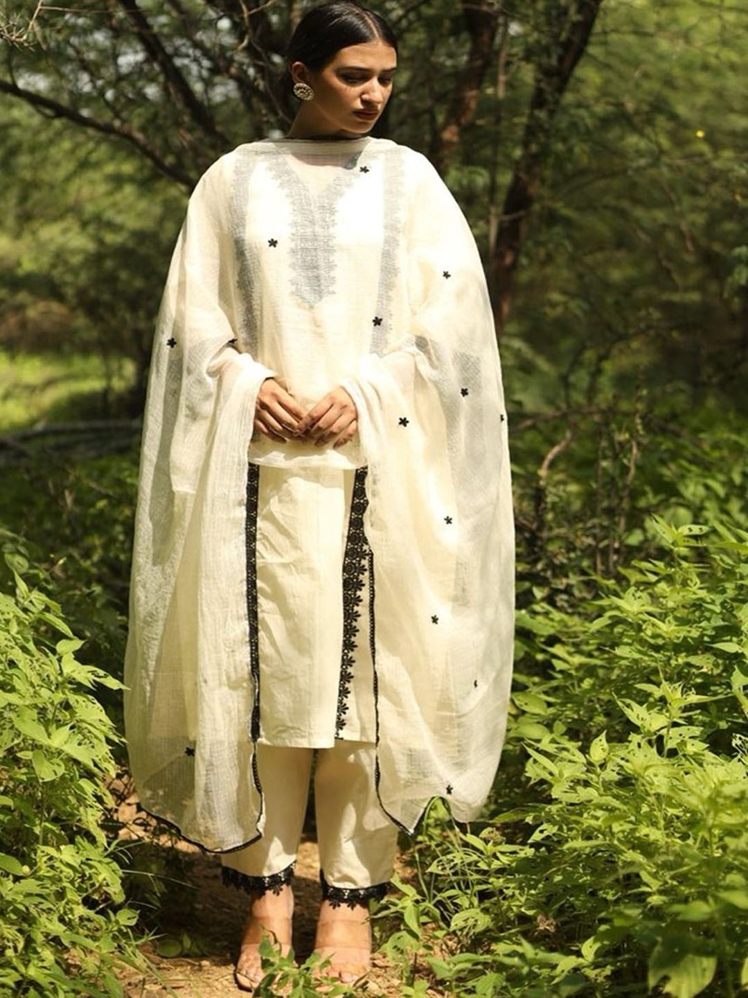ASRUMO Women Ethnic Motifs Embroidered Regular Thread Work Pure Cotton Kurta with Trousers & With Dupatta, Off white
ASRUMO Women Ethnic Motifs Embroidered Regular Thread Work Pure Cotton Kurta with Trousers & With Dupatta, Off white