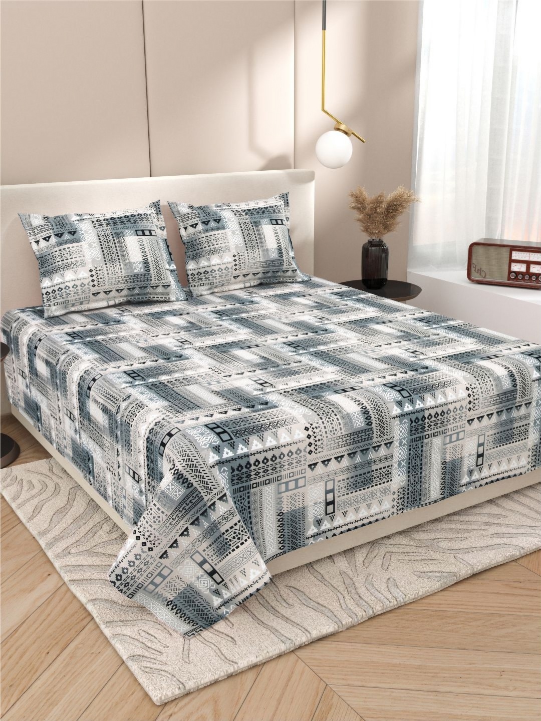 Myntra Elegant Homes Grey & White Ethnic Motifs 220 TC King Bedsheet with 2 Pillow Covers
Myntra Elegant Homes Grey & White Ethnic Motifs 220 TC King Bedsheet with 2 Pillow Covers
