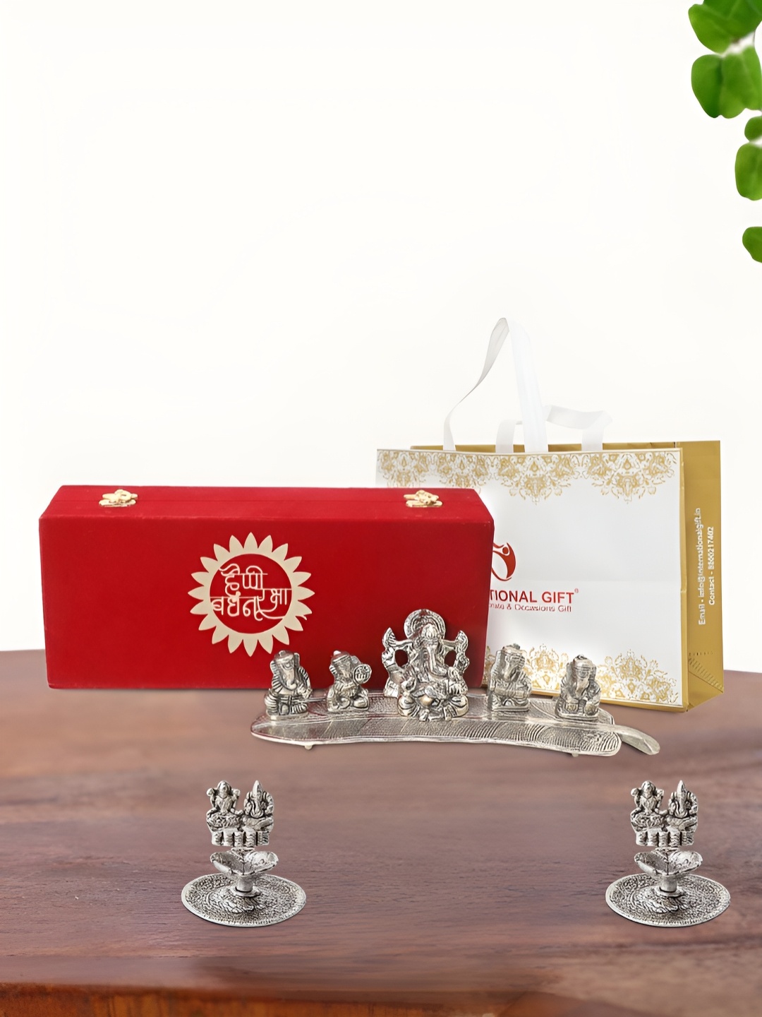 INTERNATIONAL GIFT Silver Plated Musical Ganesh Idol with 2 Diya and Box
INTERNATIONAL GIFT Silver Plated Musical Ganesh Idol with 2 Diya and Box