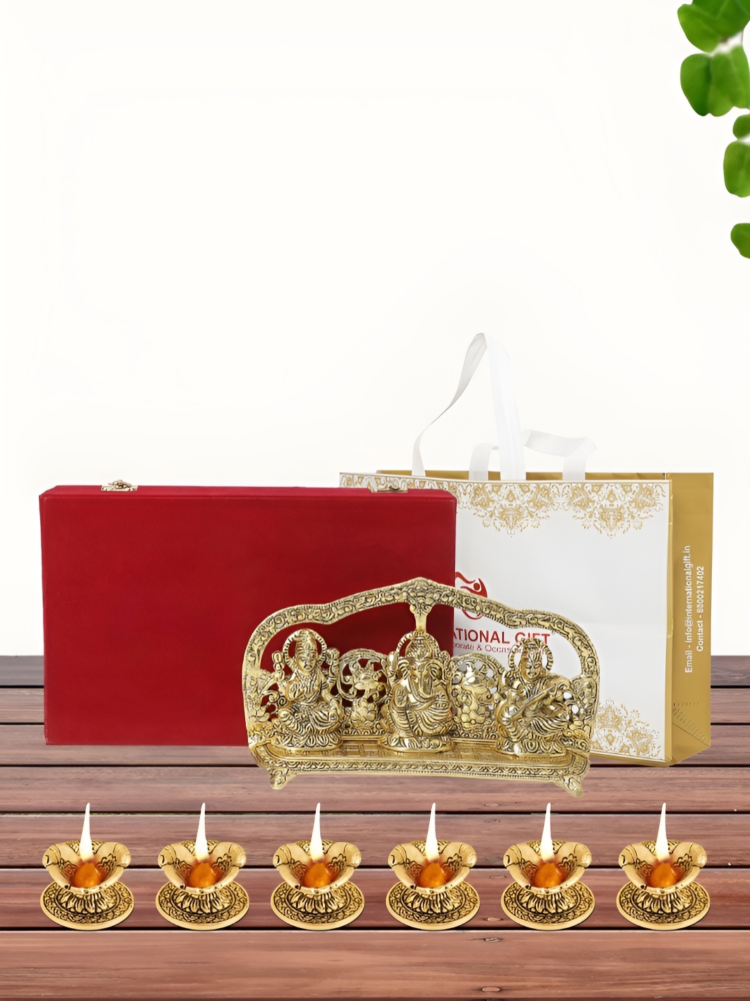 INTERNATIONAL GIFT Gold Plated Laxmi Ganesh Saraswati Idol with 6 Diya and Box
INTERNATIONAL GIFT Gold Plated Laxmi Ganesh Saraswati Idol with 6 Diya and Box