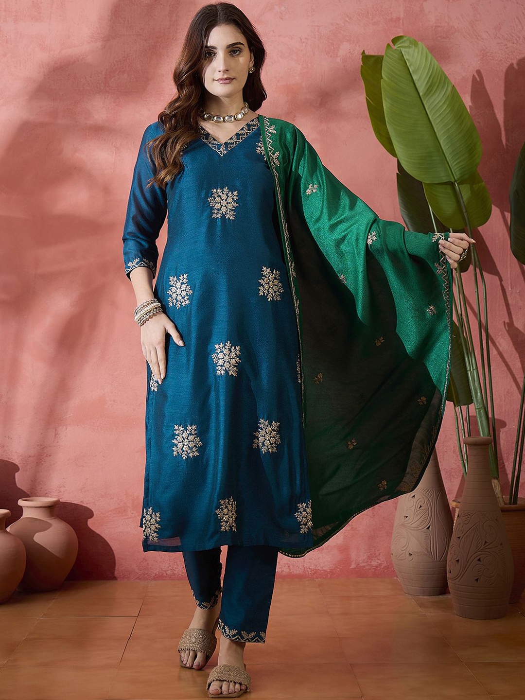Sangria Teal Floral Embroidered V-Neck Zari Straight Kurta With Trousers And Dupatta
Sangria Teal Floral Embroidered V-Neck Zari Straight Kurta With Trousers And Dupatta