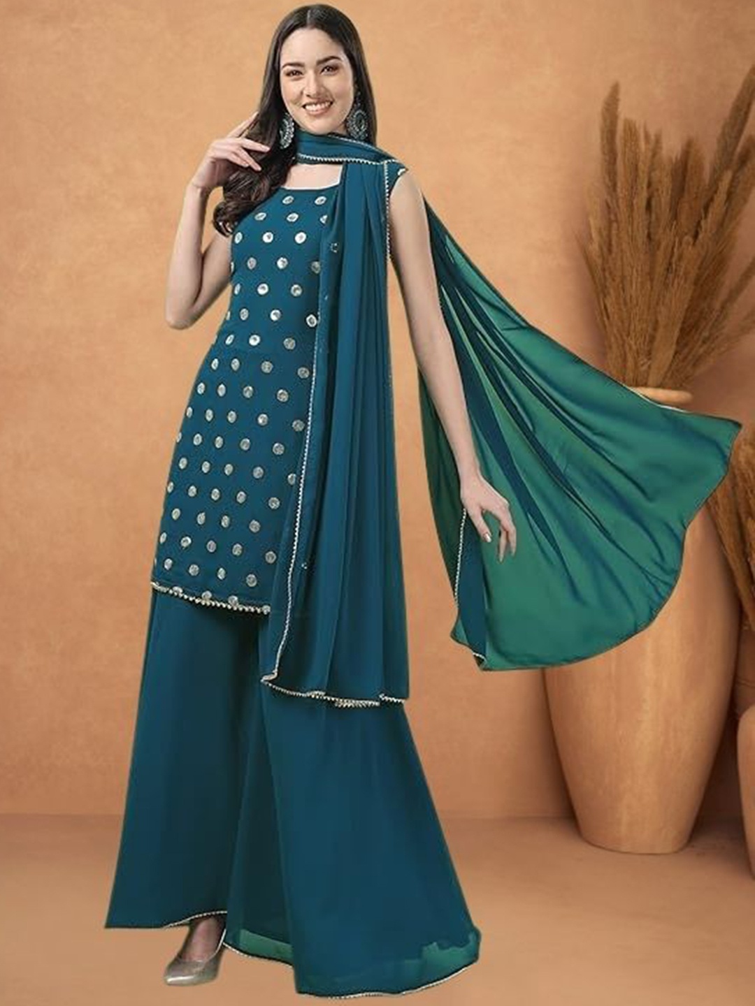 PARROT CREATION Geometric Embroidered Sequinned Georgette Kurti with Sharara And Dupatta, Turquoise blue
PARROT CREATION Geometric Embroidered Sequinned Georgette Kurti with Sharara And Dupatta, Turquoise blue