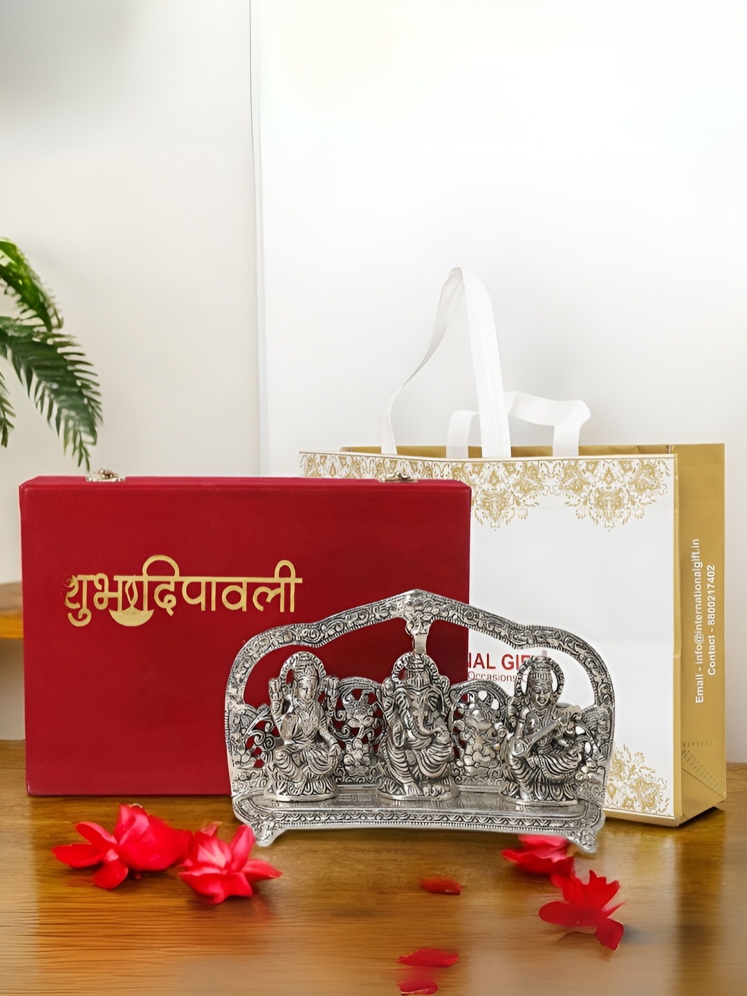INTERNATIONAL GIFT Silver-Toned Laxmi Ganesh Saraswati Religious Idol Showpiece With Box
INTERNATIONAL GIFT Silver-Toned Laxmi Ganesh Saraswati Religious Idol Showpiece With Box