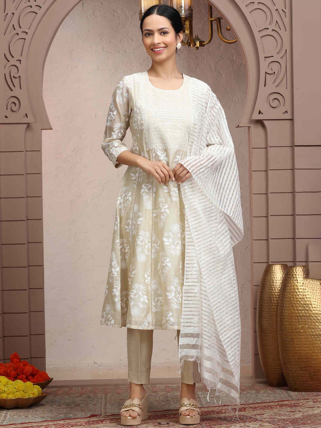 COTTON CULTURE Floral Printed Panelled Chanderi Silk A-Line Kurta With Palazzos & Dupatta, Cream
COTTON CULTURE Floral Printed Panelled Chanderi Silk A-Line Kurta With Palazzos & Dupatta, Cream