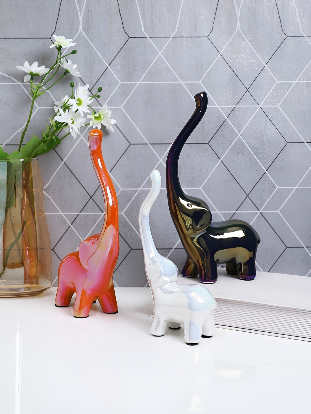 Myntra Elegant Homes White 3 Pcs Baby Elephants Birds & Animals Figurine Ceramic Showpiece
Myntra Elegant Homes White 3 Pcs Baby Elephants Birds & Animals Figurine Ceramic Showpiece