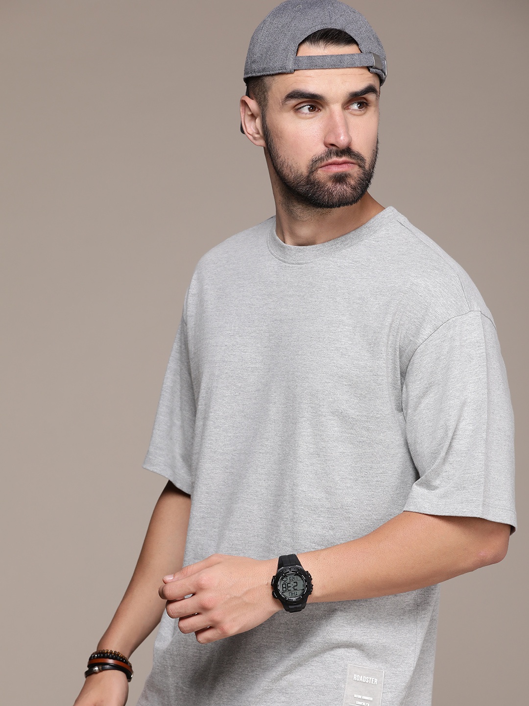 The Roadster Lifestyle Co. Oversized Fit Solid Drop-Shoulder Sleeves Pure Cotton T-shirt, Grey melange
The Roadster Lifestyle Co. Oversized Fit Solid Drop-Shoulder Sleeves Pure Cotton T-shirt, Grey melange