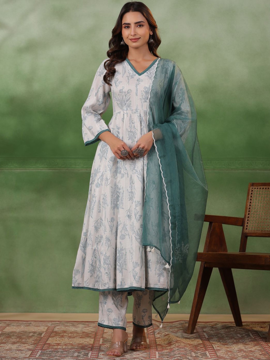 Sangria White Floral Printed V-Neck Pure Cotton A-Line Kurta With Trousers And Dupatta
Sangria White Floral Printed V-Neck Pure Cotton A-Line Kurta With Trousers And Dupatta