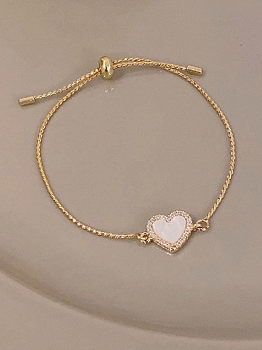 Peora Women Cubic Zirconia Gold-Plated Wraparound Bracelet
Peora Women Cubic Zirconia Gold-Plated Wraparound Bracelet