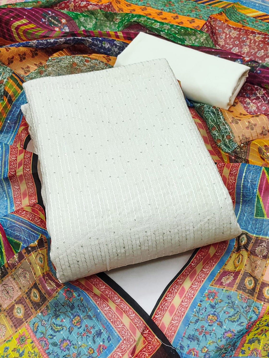 BlissFlair Striped Embroidered Sequinned Chanderi Cotton Unstitched Dress Material, White
BlissFlair Striped Embroidered Sequinned Chanderi Cotton Unstitched Dress Material, White
