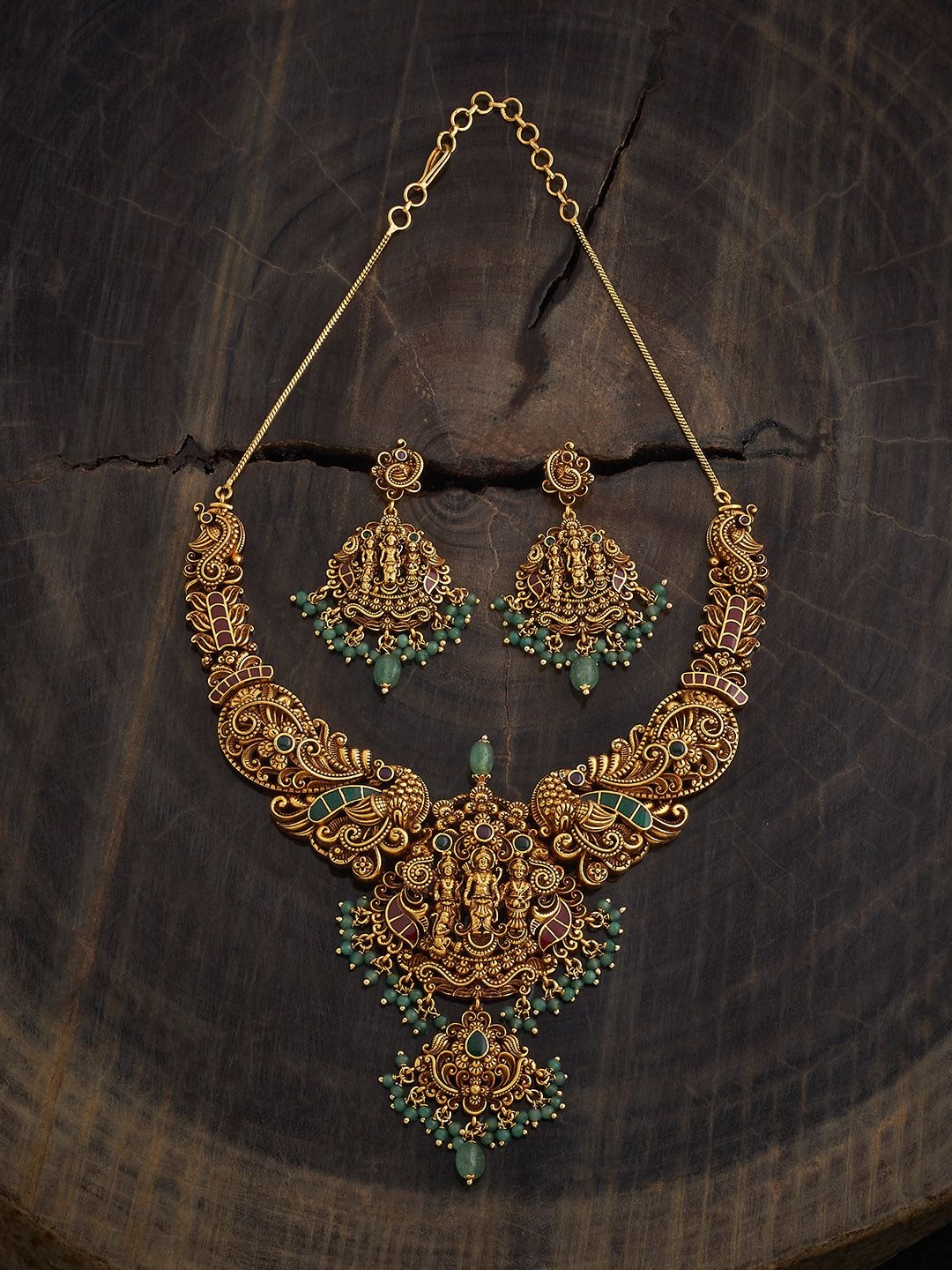 Kushal's Fashion Jewellery Ruby-Green Gold-Plated Stone Studded & Beaded Antique Necklace
Kushal's Fashion Jewellery Ruby-Green Gold-Plated Stone Studded & Beaded Antique Necklace