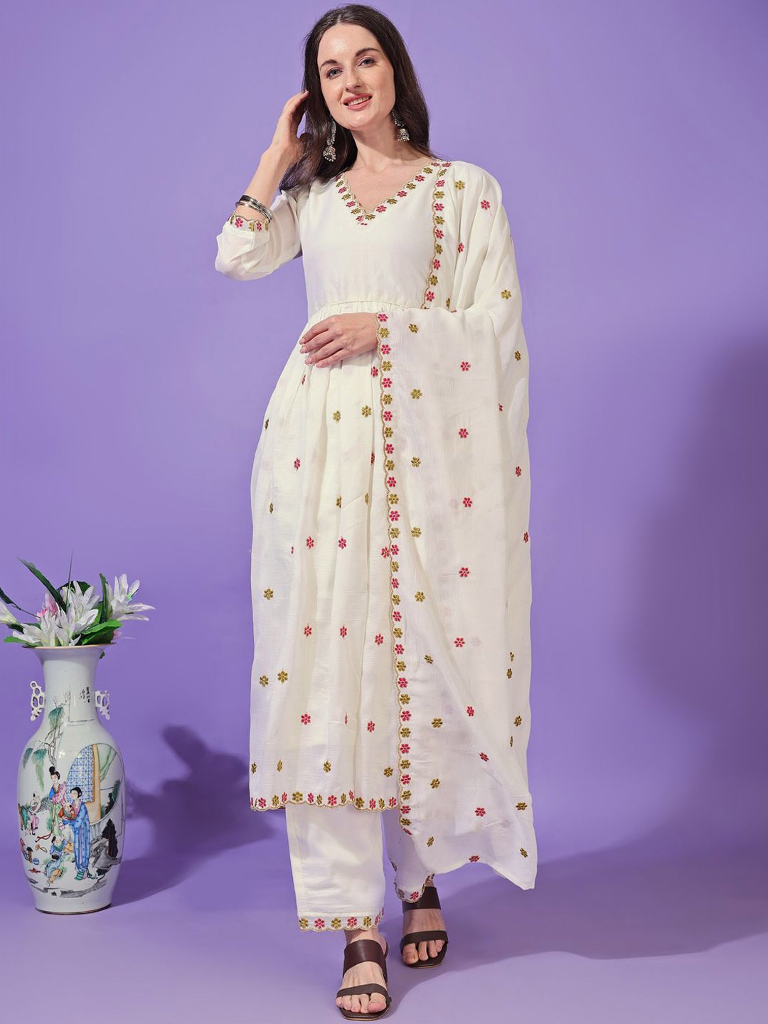 KALINI Floral Embroidered V Neck Pleated Anarkali Kurta With Palazzos And Dupatta, White
KALINI Floral Embroidered V Neck Pleated Anarkali Kurta With Palazzos And Dupatta, White