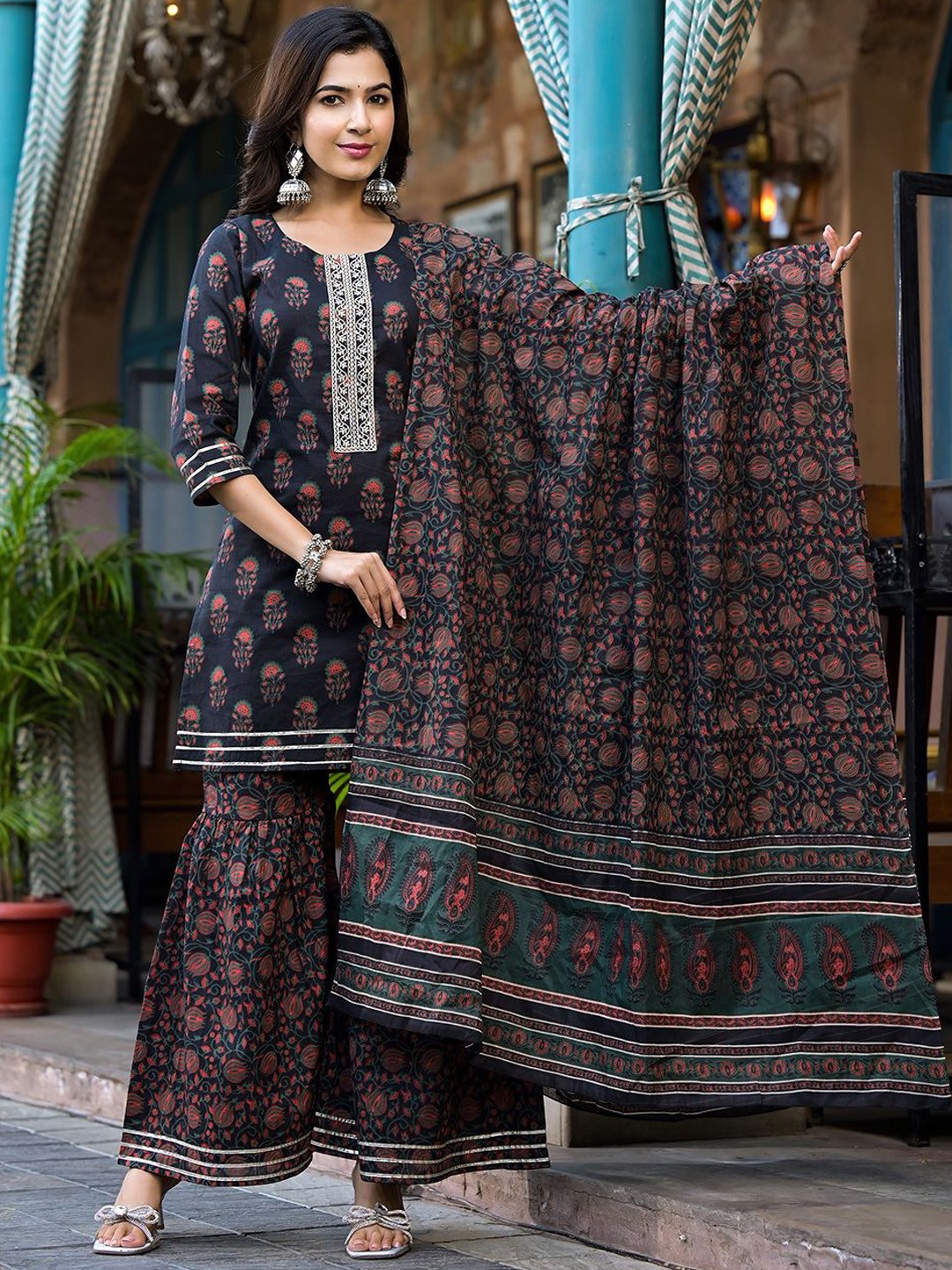 KALINI Floral Printed Zari Work Pure Cotton Straight Kurta With Sharara And Dupatta, Black
KALINI Floral Printed Zari Work Pure Cotton Straight Kurta With Sharara And Dupatta, Black
