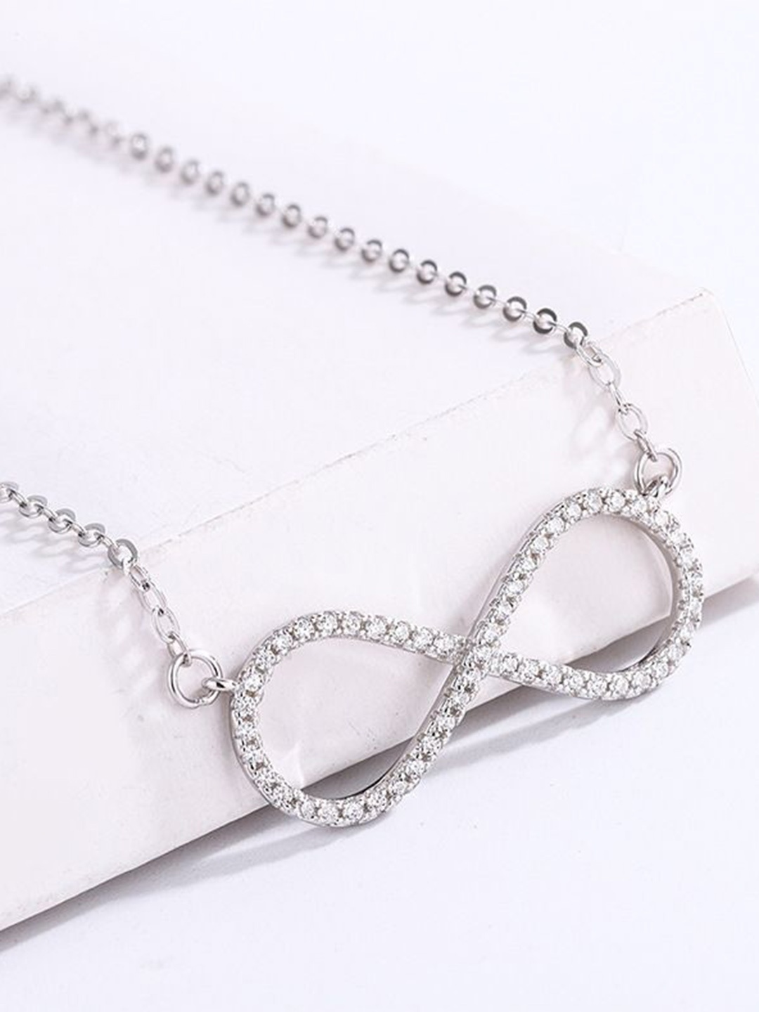 DIVASTRI Stainless Steel Silver-Plated CZ Studded Infinity Shaped Pendants With Chains
DIVASTRI Stainless Steel Silver-Plated CZ Studded Infinity Shaped Pendants With Chains