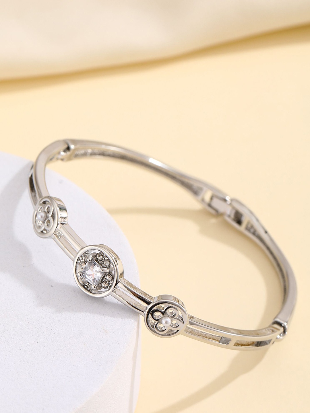 Shining Diva Fashion Silver-Plated Crystals And Stones Studded Bangle-Style Bracelet
Shining Diva Fashion Silver-Plated Crystals And Stones Studded Bangle-Style Bracelet