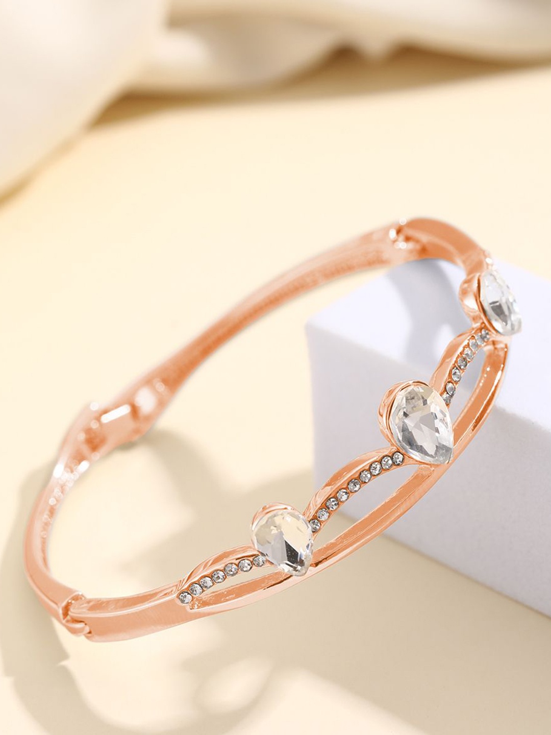 Shining Diva Fashion Rose Gold-Plated Crystals And Stones Studded Bangle-Style Bracelet
Shining Diva Fashion Rose Gold-Plated Crystals And Stones Studded Bangle-Style Bracelet