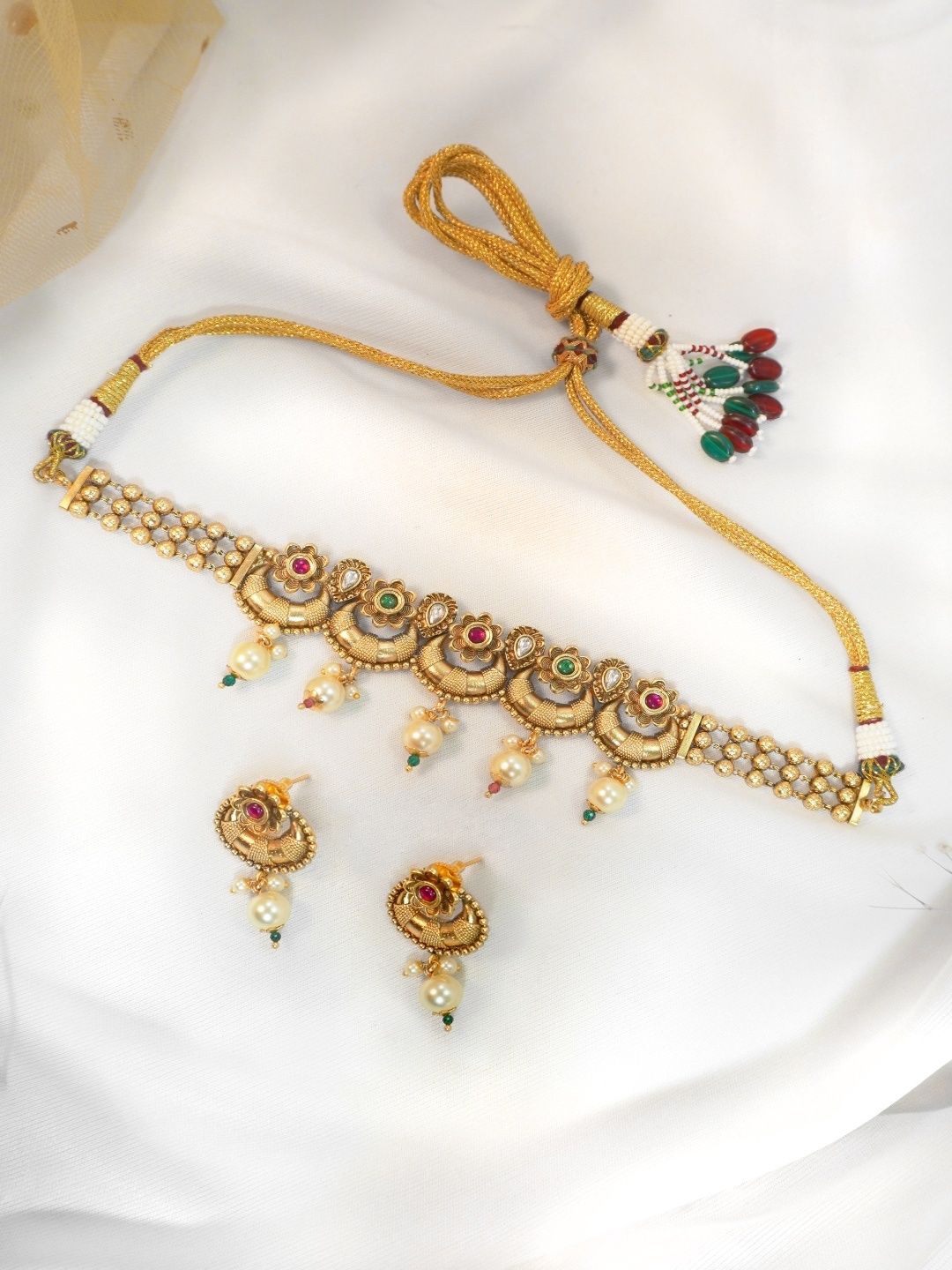Niscka 24K Gold Plated Artificial Stones and Beads -Studded Necklace With Drop Earrings
Niscka 24K Gold Plated Artificial Stones and Beads -Studded Necklace With Drop Earrings