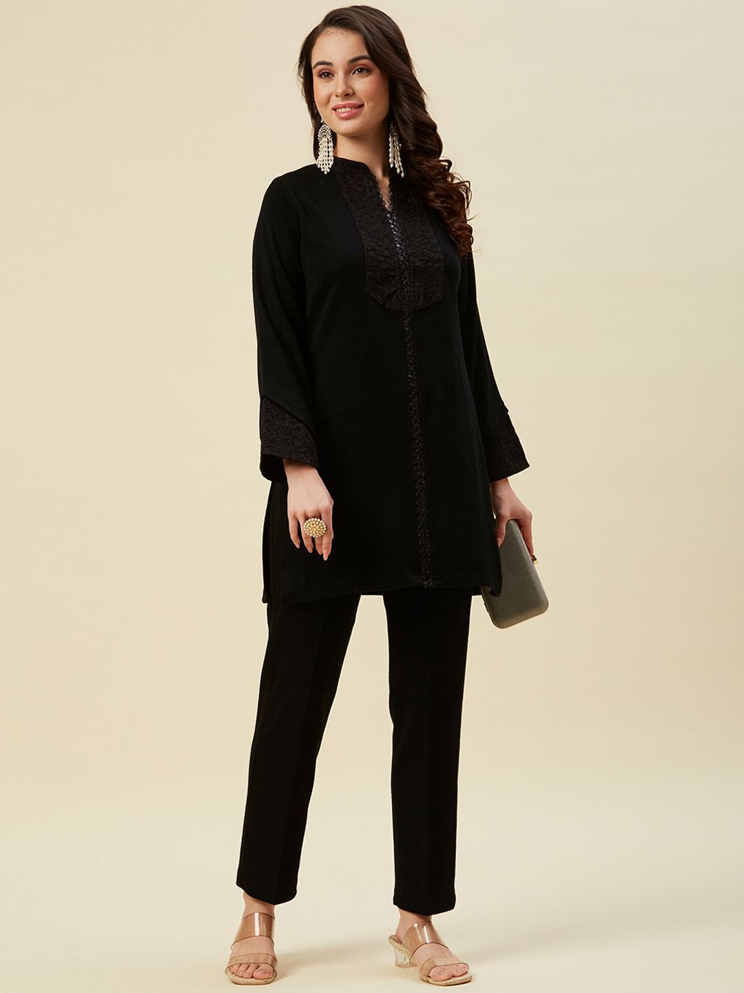 Peachmode Floral Yoke Design Thread Work Pure Wool Straight Kurta With Trousers, Black
Peachmode Floral Yoke Design Thread Work Pure Wool Straight Kurta With Trousers, Black