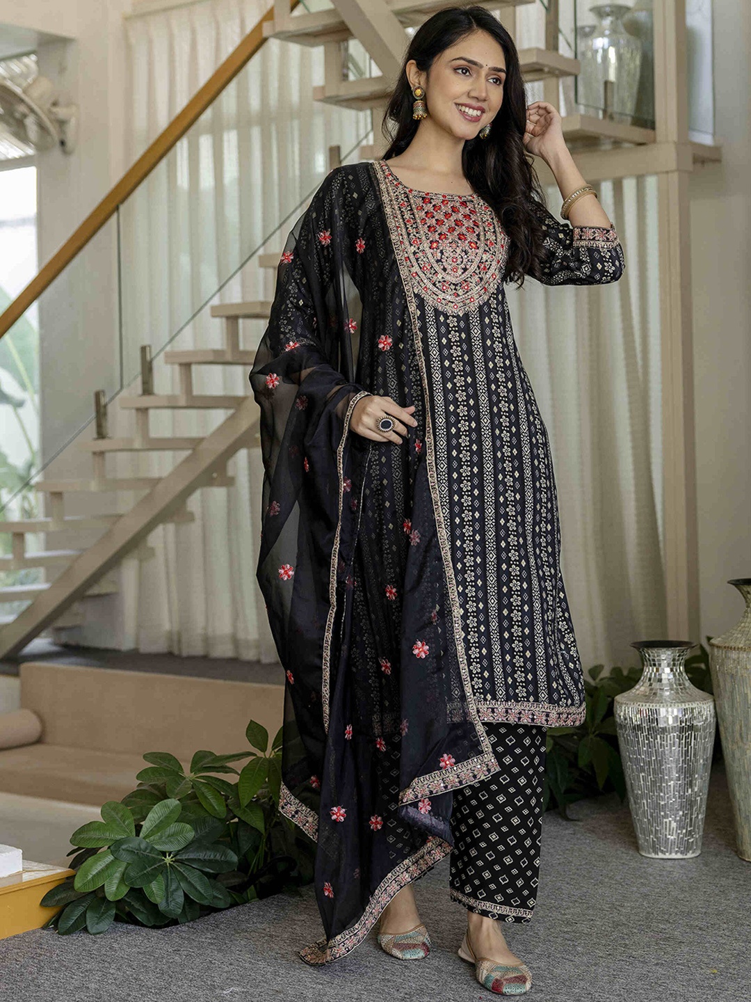 Gauric creation Floral Embroidered Sequinned Straight Kurta with Trousers And Dupatta, Black
Gauric creation Floral Embroidered Sequinned Straight Kurta with Trousers And Dupatta, Black