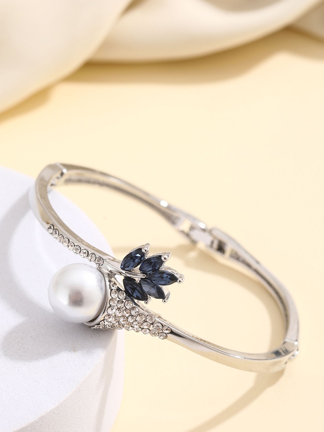 Shining Diva Fashion Silver-Plated Crystals And Stones Studded Bangle-Style Bracelet
Shining Diva Fashion Silver-Plated Crystals And Stones Studded Bangle-Style Bracelet