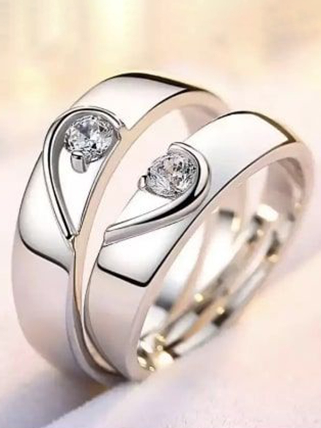 Omaya Jewels Set of 2 Silver-Plated Artificial Stone-Studded Couple Finger Rings, Steel
Omaya Jewels Set of 2 Silver-Plated Artificial Stone-Studded Couple Finger Rings, Steel
