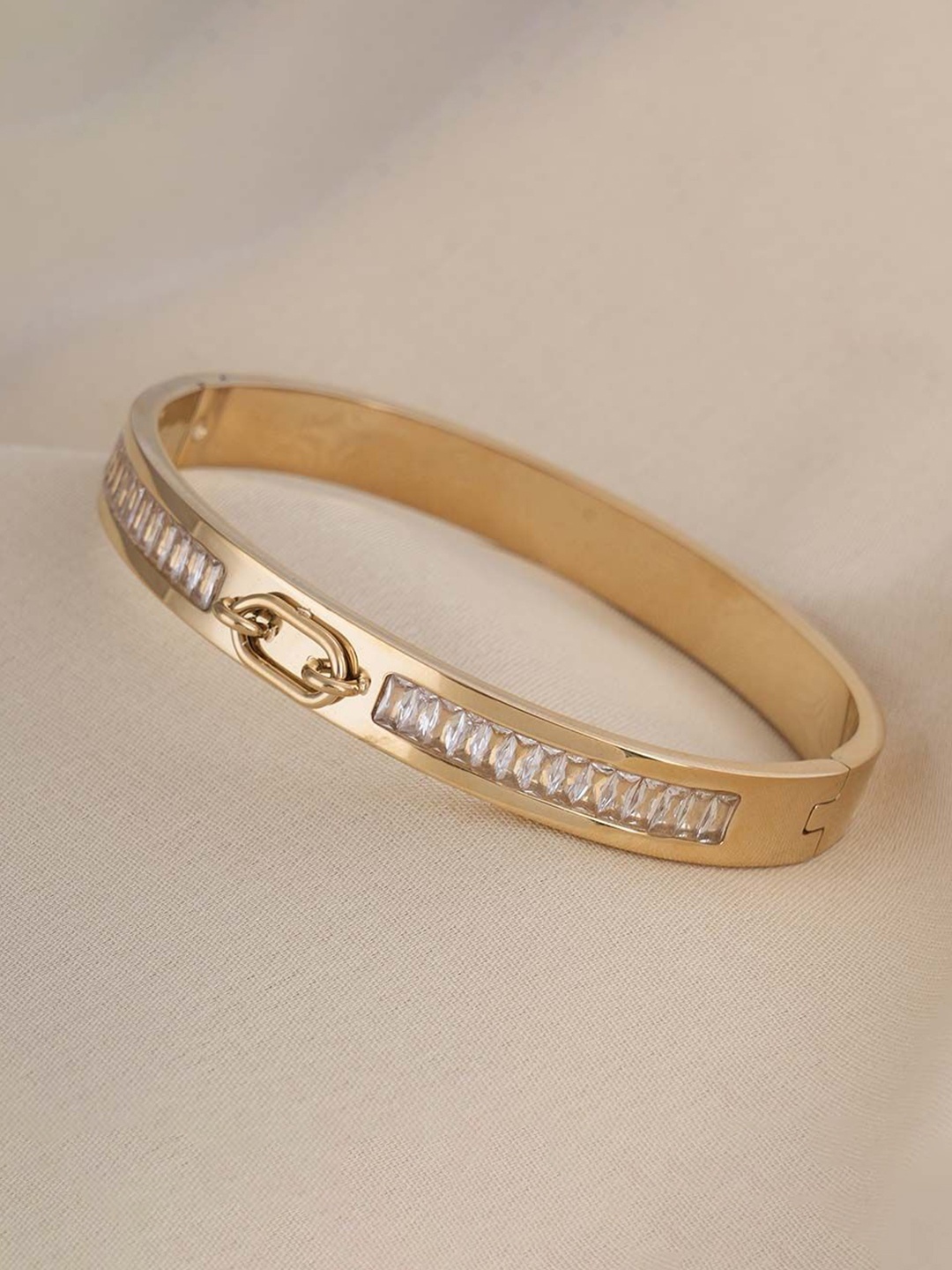 PALMONAS Women Gold-Plated Anti-Tarnish Cubic Zirconia Studded Bangle-Style Bracelet
PALMONAS Women Gold-Plated Anti-Tarnish Cubic Zirconia Studded Bangle-Style Bracelet