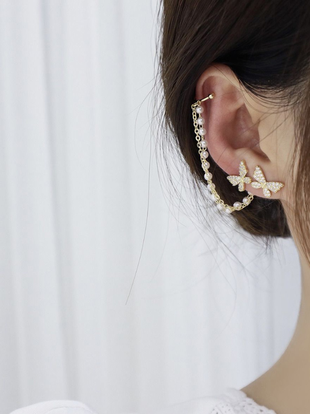 Celestique Artificial Stones Studded And Pearls Beaded Butterfly Shaped Ear Cuffs, Gold
Celestique Artificial Stones Studded And Pearls Beaded Butterfly Shaped Ear Cuffs, Gold