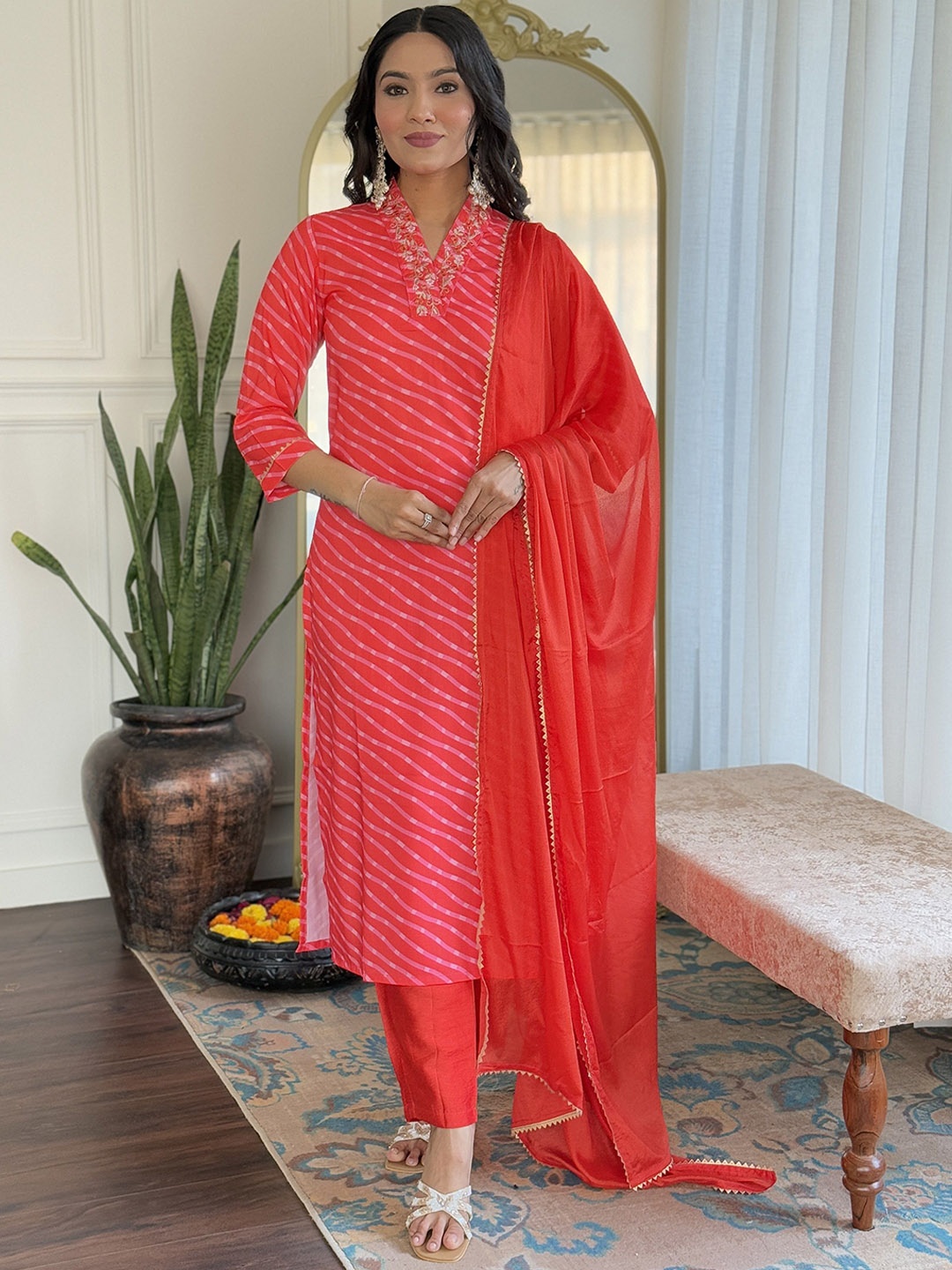 KALINI Leheriya Printed V-Neck Cotton Blend Straight Kurta With Trousers And Dupatta, Red
KALINI Leheriya Printed V-Neck Cotton Blend Straight Kurta With Trousers And Dupatta, Red