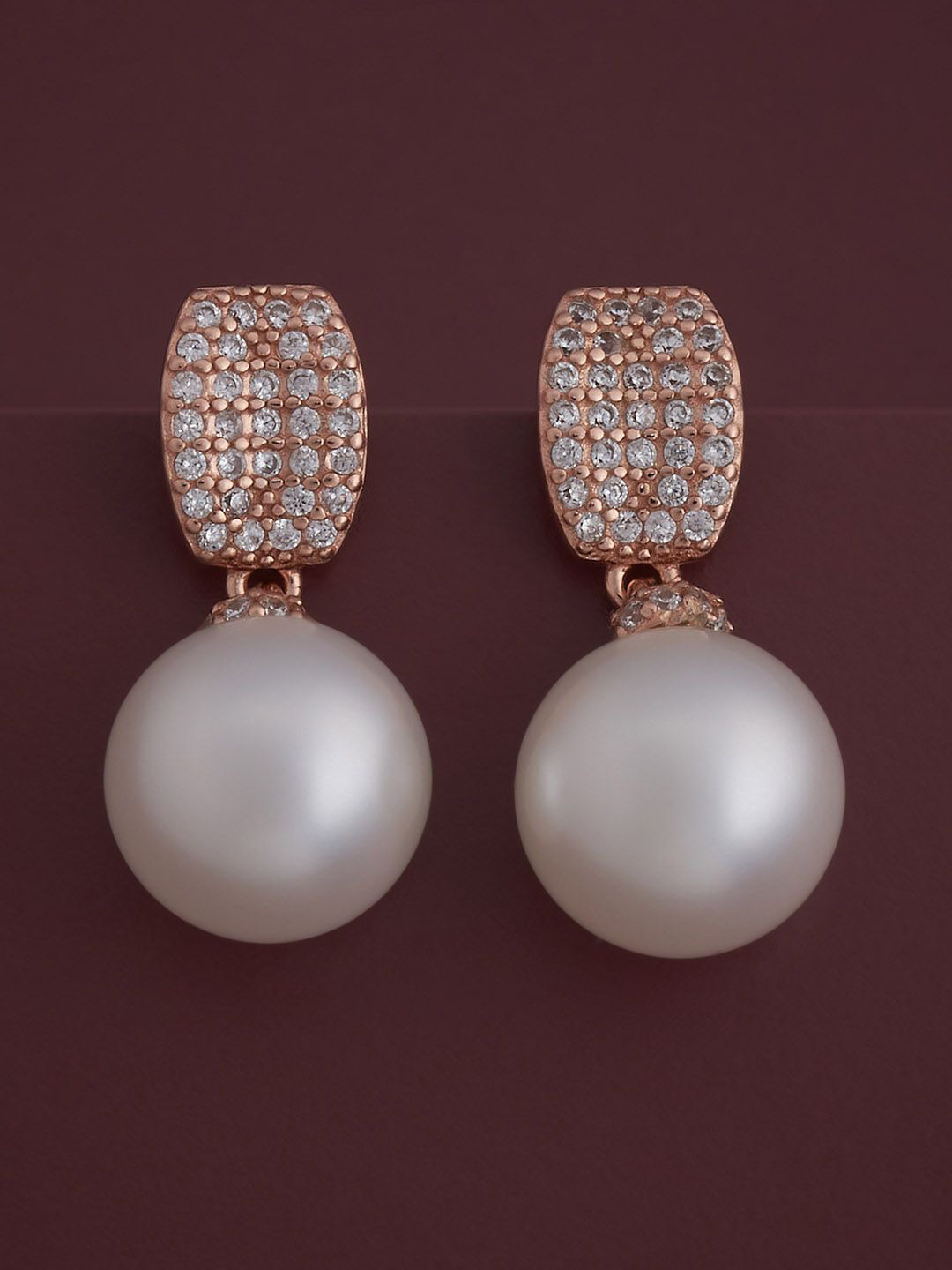 Kushal's Fashion Jewellery 92.5 Silver Rose Gold-Plated Zircon Studded Earrings 
Kushal's Fashion Jewellery 92.5 Silver Rose Gold-Plated Zircon Studded Earrings