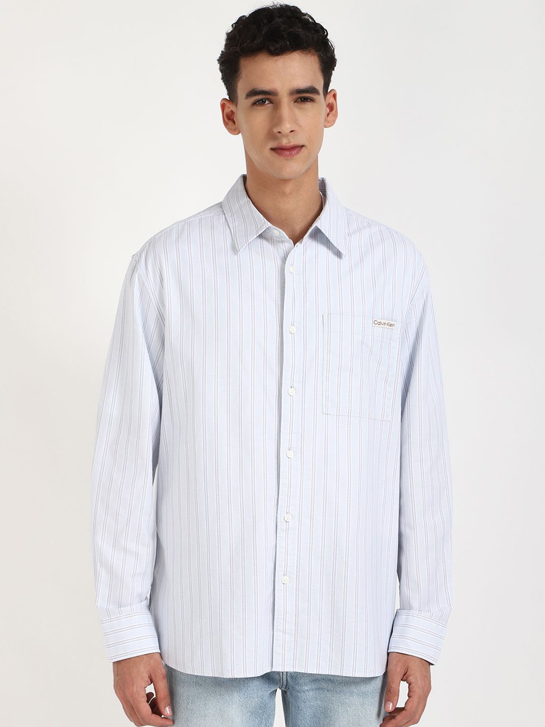 Calvin Klein Jeans Men Relaxed Fit Spread Collar Vertical Striped Cotton Casual Shirt, Blue
Calvin Klein Jeans Men Relaxed Fit Spread Collar Vertical Striped Cotton Casual Shirt, Blue