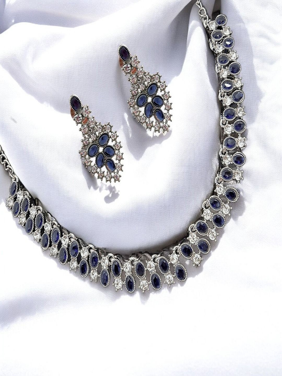 AccessHer Silver Plated American Diamond Studded Necklace and Earrings With Maang Tika
AccessHer Silver Plated American Diamond Studded Necklace and Earrings With Maang Tika