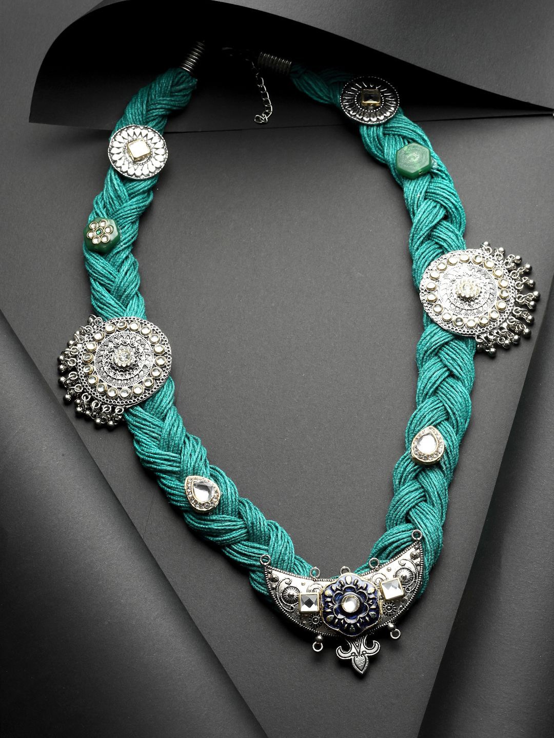 Moedbuille Silver-Plated Stone Studded Antique Design Oxidised Bohemian Jute Necklace
Moedbuille Silver-Plated Stone Studded Antique Design Oxidised Bohemian Jute Necklace