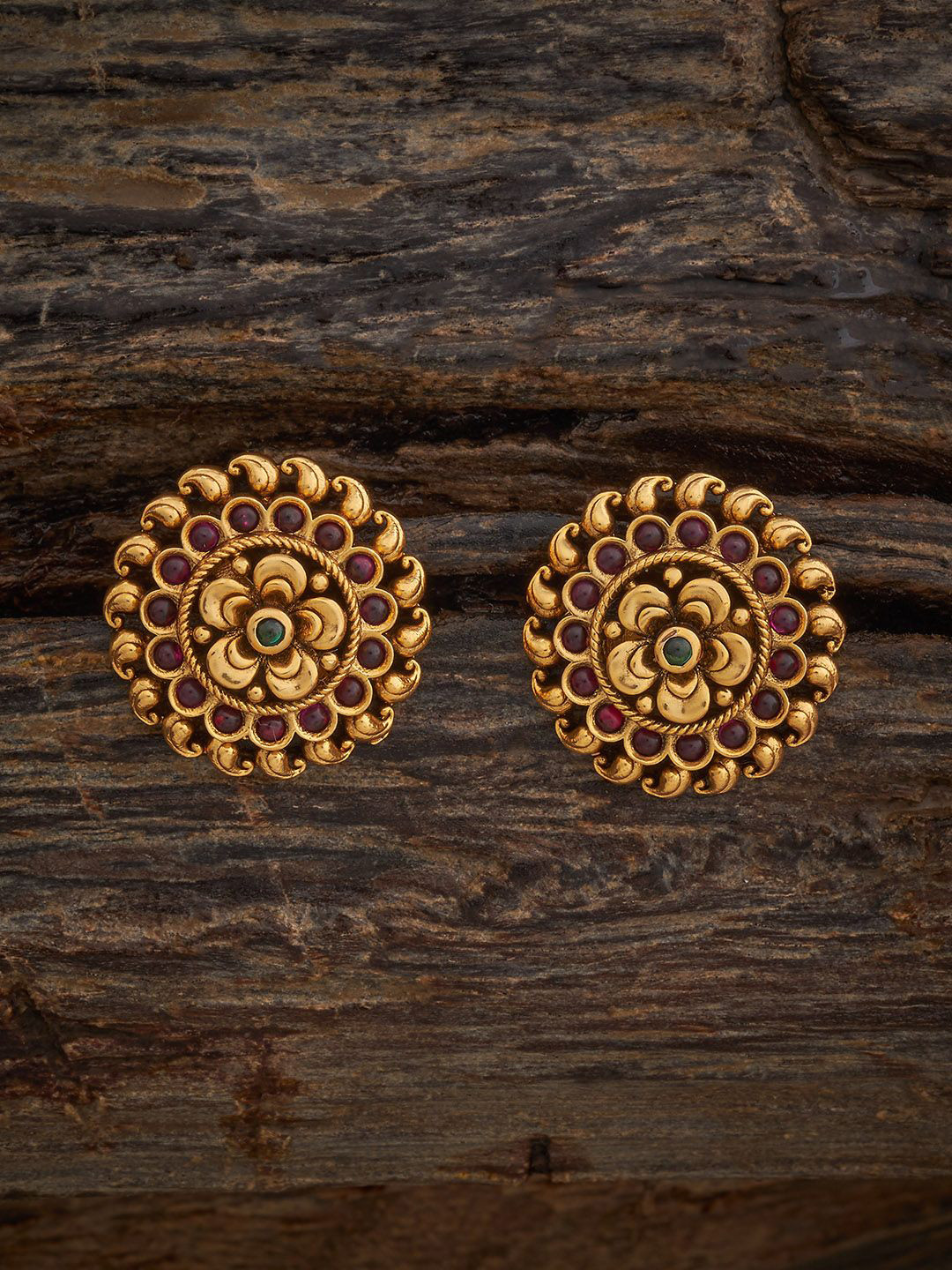 Kushal's Fashion Jewellery Gold Plated Ruby Studded Floral Studs Earrings 
Kushal's Fashion Jewellery Gold Plated Ruby Studded Floral Studs Earrings