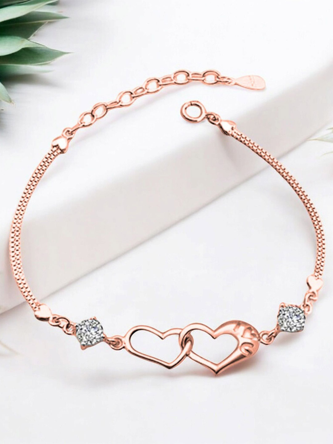 Nilu's Collection Rose Gold-Plated CZ Studded Interlocked Heart Duo Shaped Link Bracelet
Nilu's Collection Rose Gold-Plated CZ Studded Interlocked Heart Duo Shaped Link Bracelet