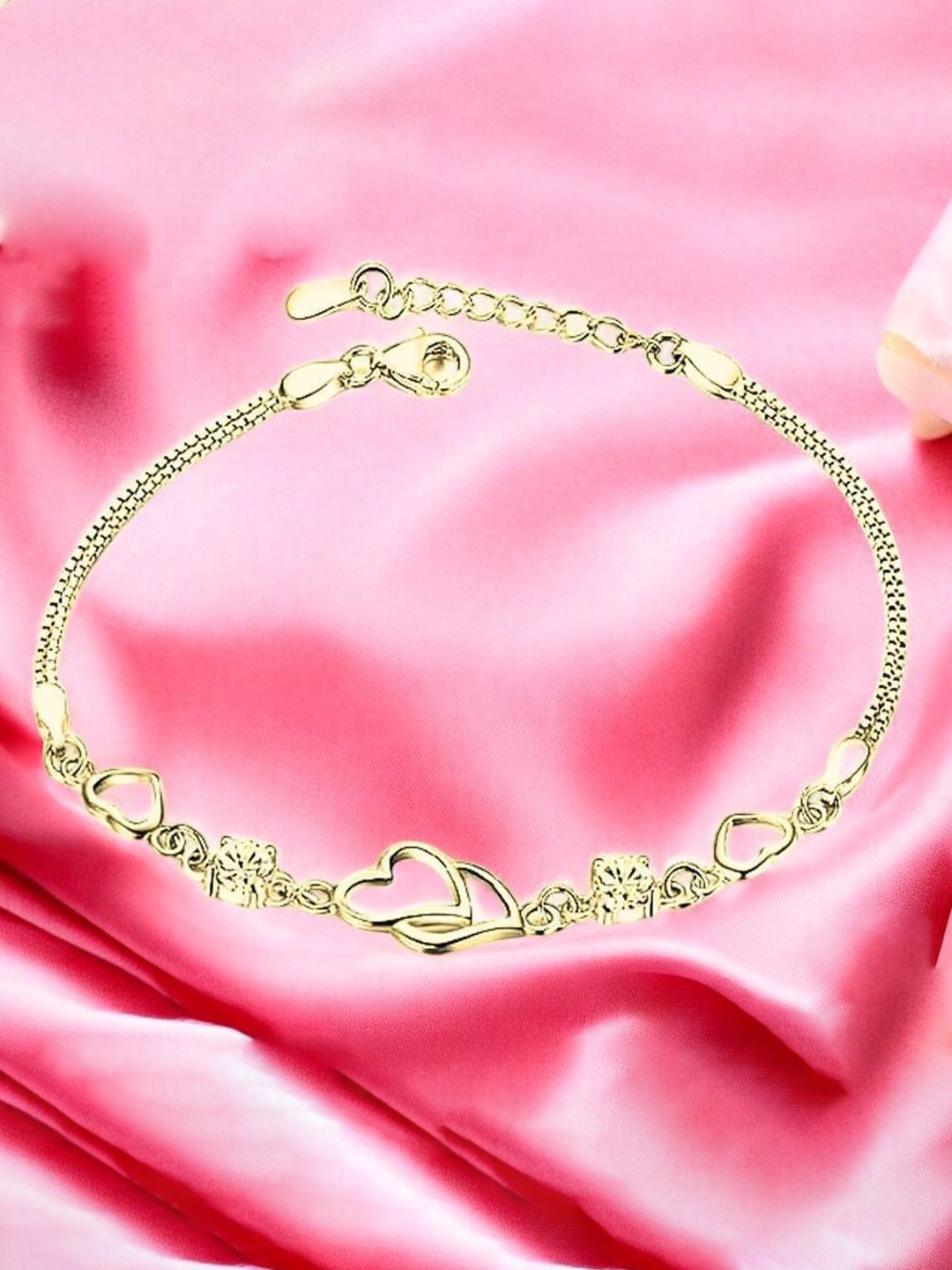 Nilu's Collection Gold-Plated Cubic Zirconia Studded Heart Duo Shaped Link Bracelet
Nilu's Collection Gold-Plated Cubic Zirconia Studded Heart Duo Shaped Link Bracelet