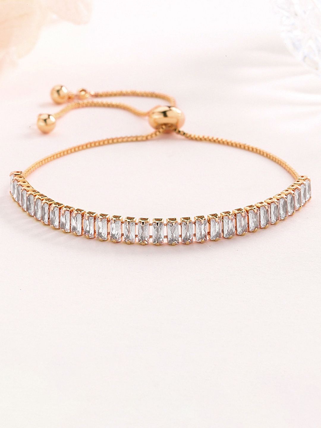 Peora Gold-Plated Crystals Baguette Stone Studded Adjustable Wraparound Bracelet
Peora Gold-Plated Crystals Baguette Stone Studded Adjustable Wraparound Bracelet