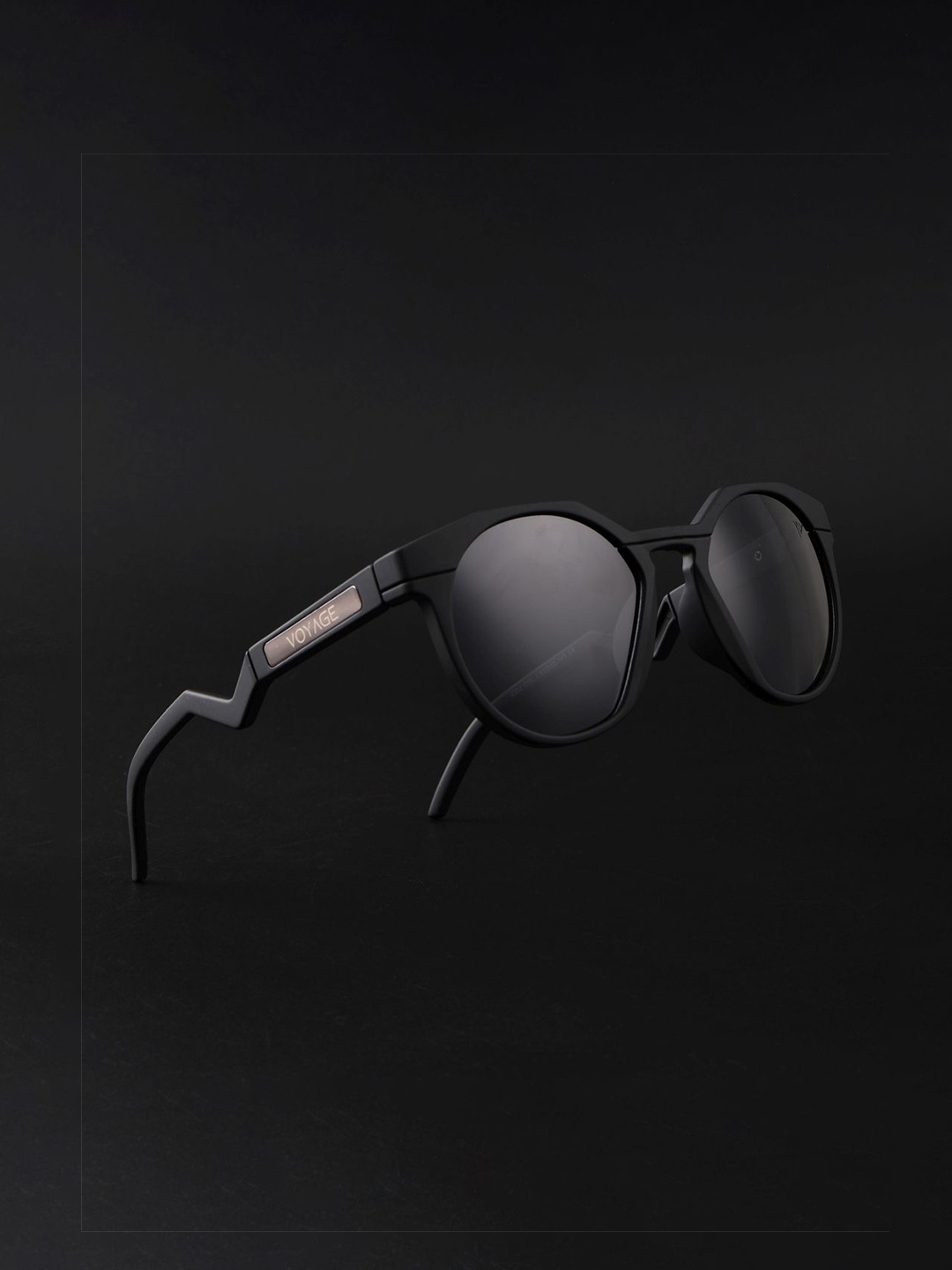 Voyage Unisex Round Sunglasses with Polarised and UV Protected Lens 2352PMG6563, Black
Voyage Unisex Round Sunglasses with Polarised and UV Protected Lens 2352PMG6563, Black