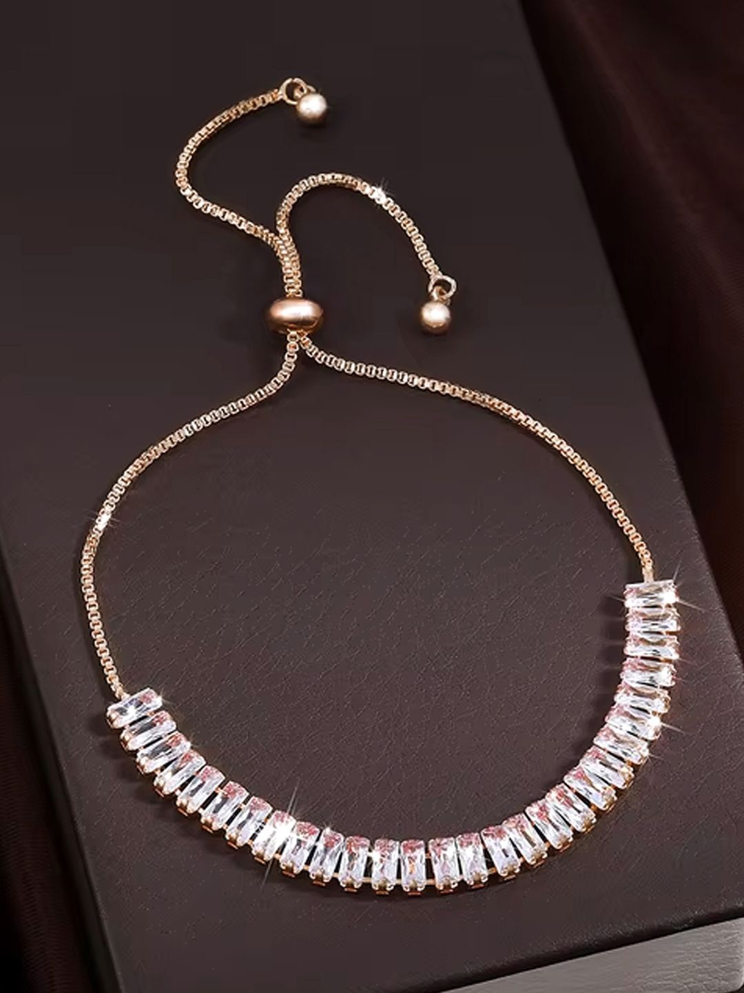 Peora Rose Gold Plated Baguette Crystals Stone Studded Adjustable Wraparound Bracelet
Peora Rose Gold Plated Baguette Crystals Stone Studded Adjustable Wraparound Bracelet