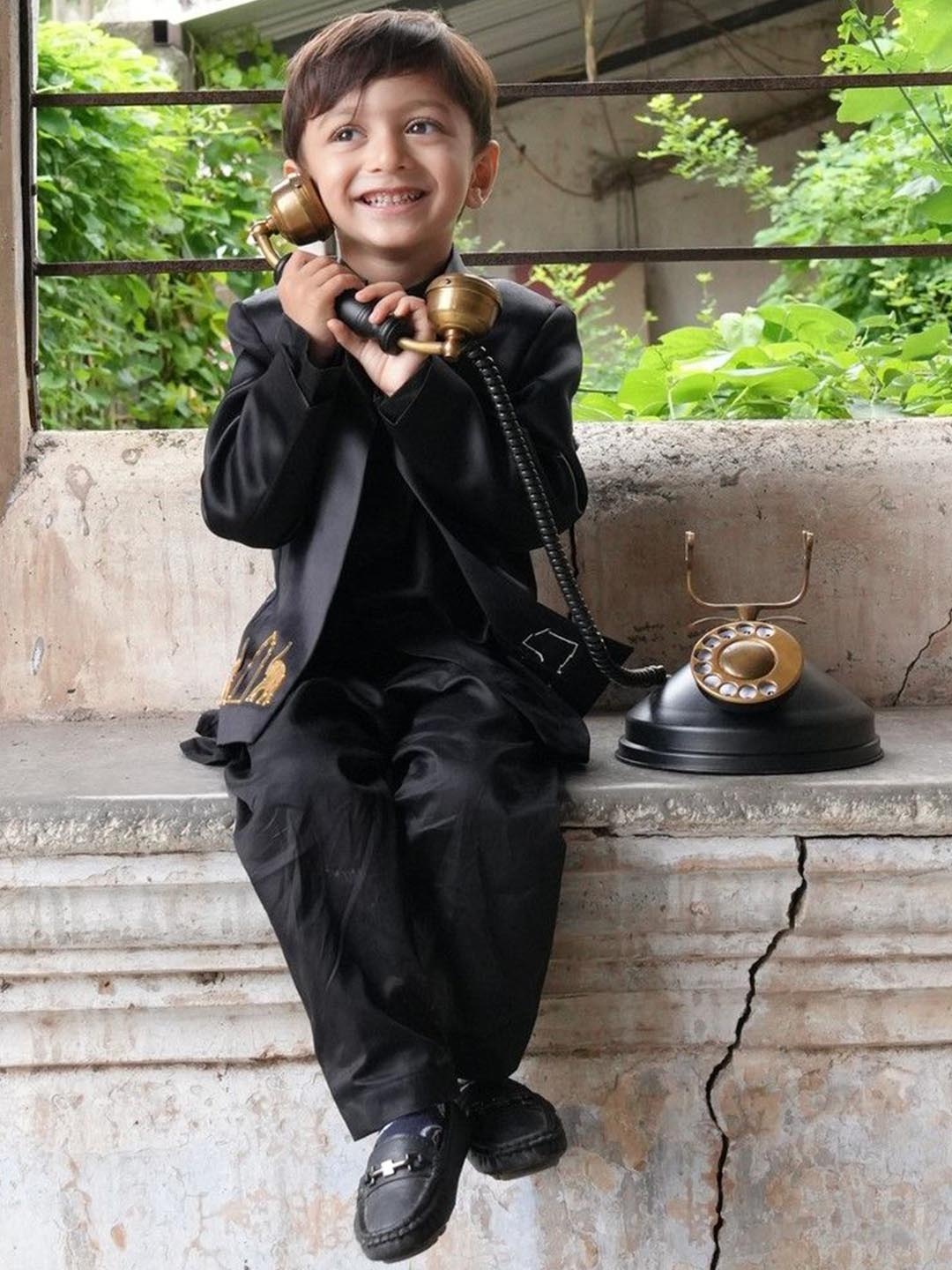 Funny Bones Clothings Boys Band Collar Straight Kurta With Trousers & Jodhpuri Blazer, Black
Funny Bones Clothings Boys Band Collar Straight Kurta With Trousers & Jodhpuri Blazer, Black