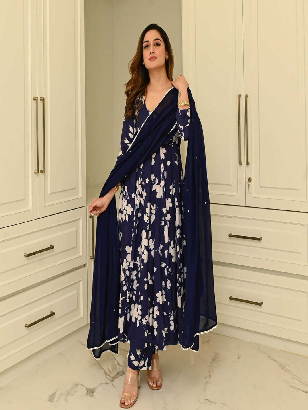 KALINI Floral Printed Scoop Neck Anarkali Kurta With Palazzos And Dupatta, Blue
KALINI Floral Printed Scoop Neck Anarkali Kurta With Palazzos And Dupatta, Blue