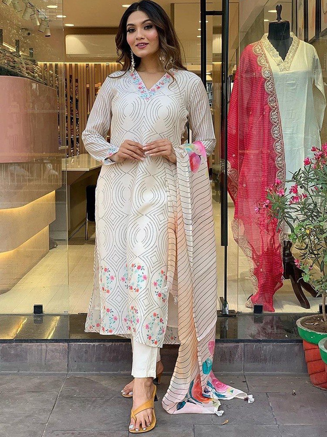 KALINI Women Printed Regular Beads and Stones Kurta with Trousers & With Dupatta, Off white
KALINI Women Printed Regular Beads and Stones Kurta with Trousers & With Dupatta, Off white