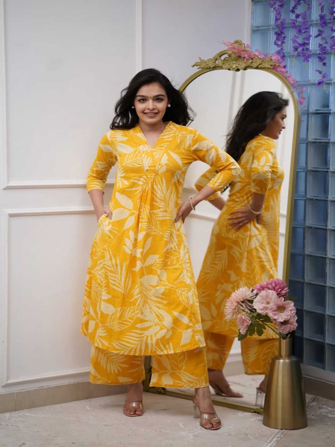ETHNIC VILLAA Floral Printed V-Neck Mirror Work A-Line Kurta With Palazzos, Yellow
ETHNIC VILLAA Floral Printed V-Neck Mirror Work A-Line Kurta With Palazzos, Yellow